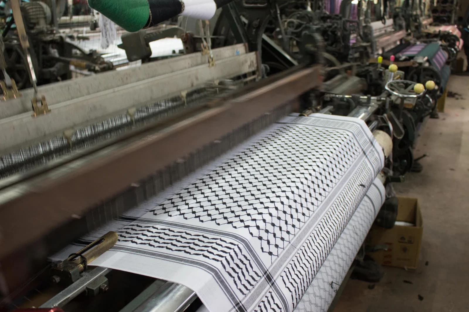Keffiyeh weaving or production inside the Hirbawi textile factory in Hebron