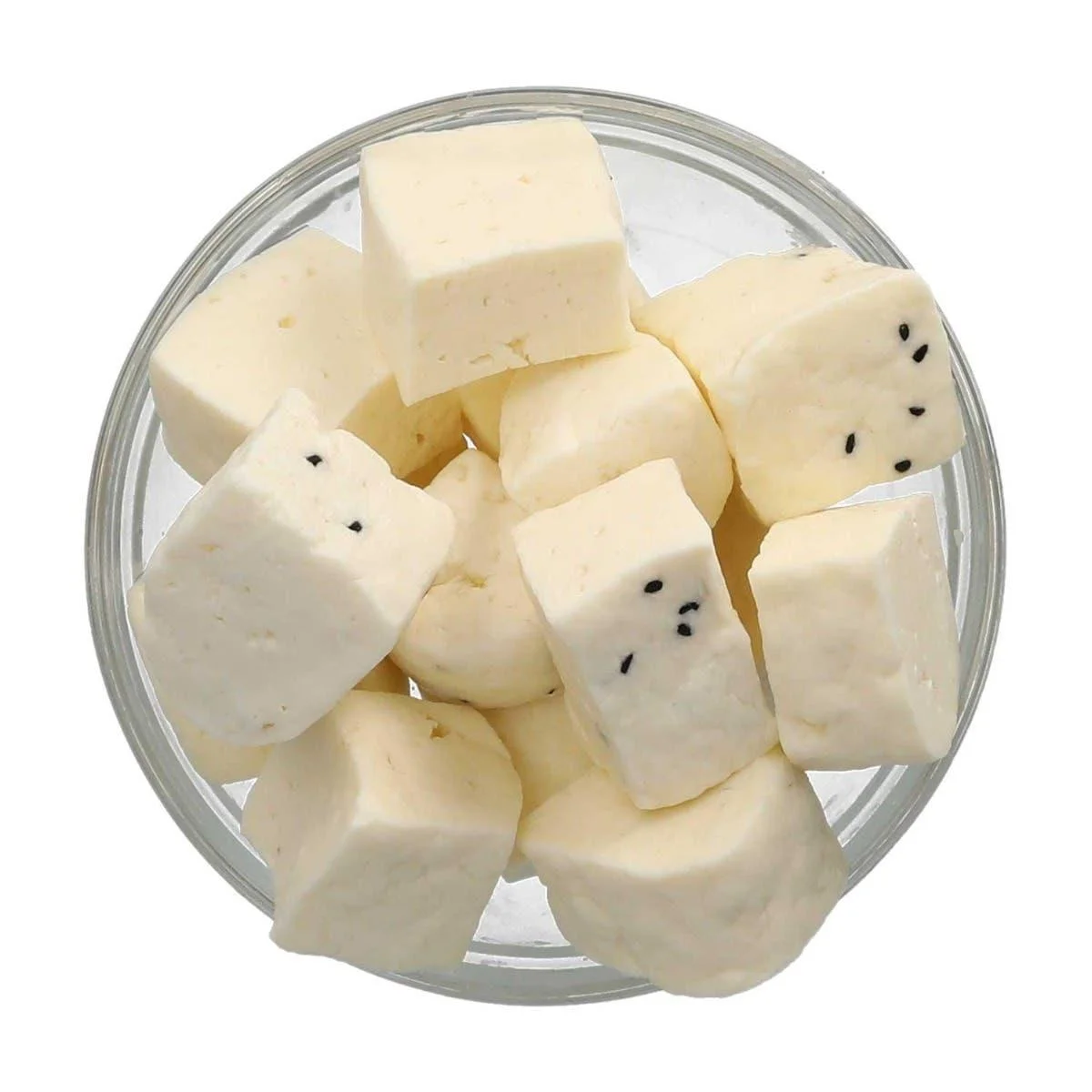 Cubes of white brined Nabulsi-style cheese soaking in fresh water before use in knafeh.